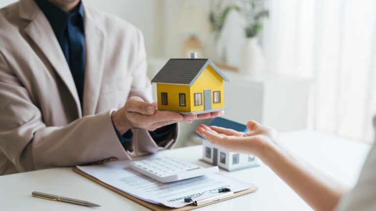 consultant with house toy model