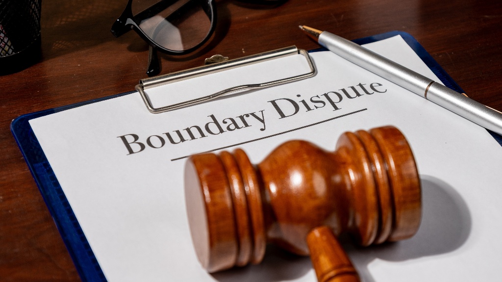 How to Resolve Boundary Line Disputes Between Minnesota Property Owners